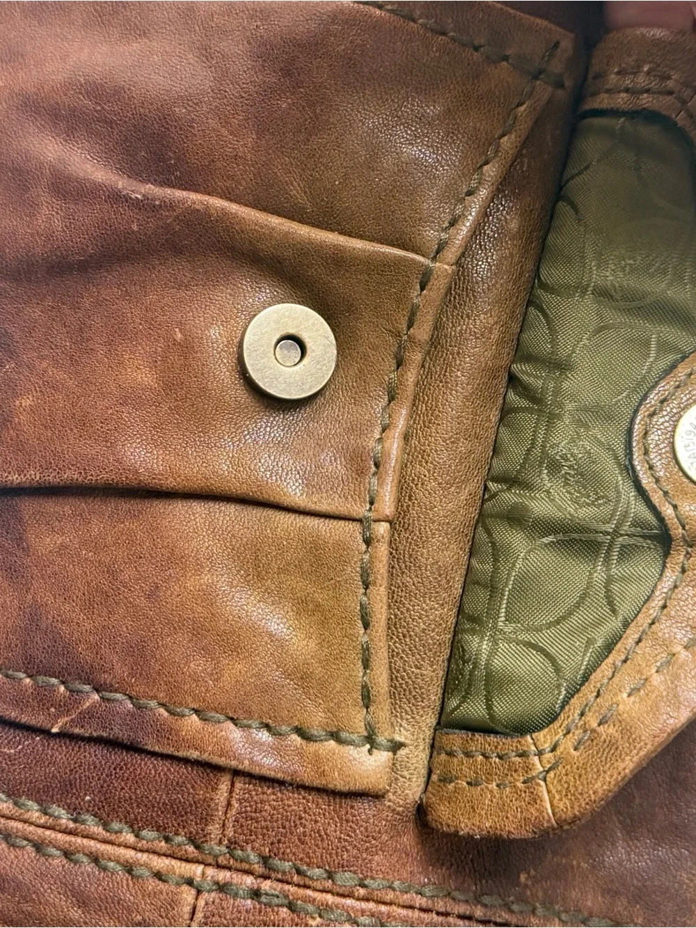 Hyper Distressed Fossil Vintage Bag.